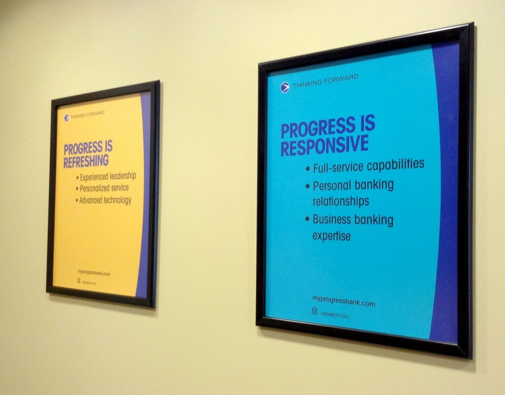 Progress Bank branch posters before the redesign.